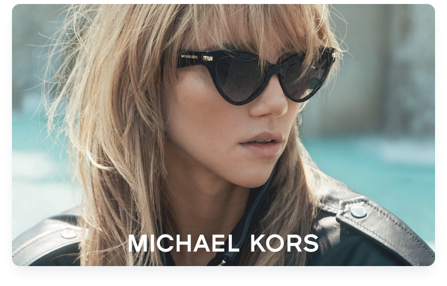 Woman wearing Michael Kors designer sunglasses